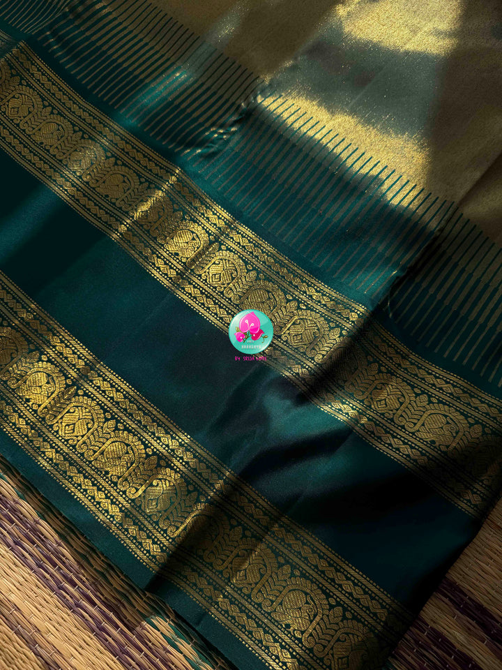 Jewel-Toned Metallic Grace: Teal Green 2G Pure Kanchipattu Tissue Saree with Traditional Gap Border