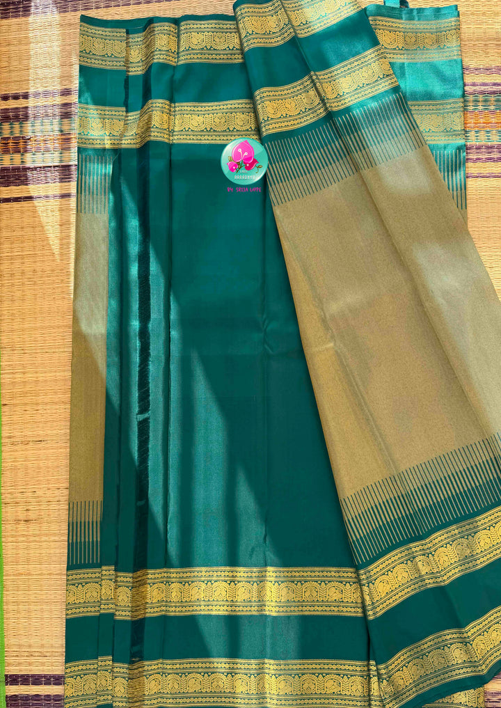 Jewel-Toned Metallic Grace: Teal Green 2G Pure Kanchipattu Tissue Saree with Traditional Gap Border