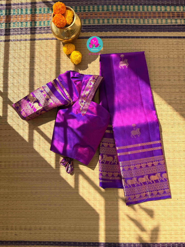 Ethereal Radiance: Dual-Tone Violet Kanchipattu with Antique Zari & Sacred Nandhini Motifs