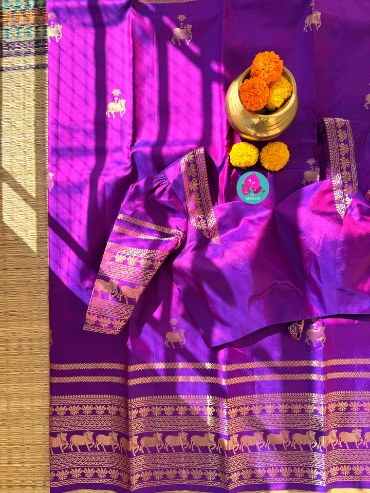 Ethereal Radiance: Dual-Tone Violet Kanchipattu with Antique Zari & Sacred Nandhini Motifs