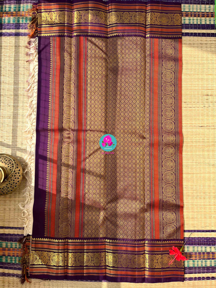 Regal Serenity: Ivory Kanjivaram Saree in Vaira Oosi with Royal Purple Contrast
