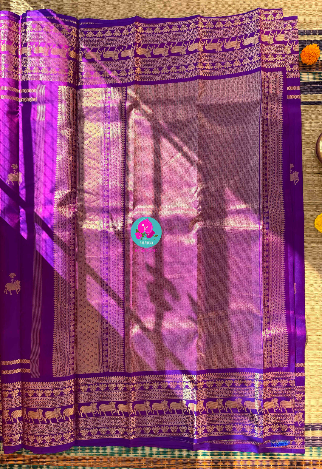 Ethereal Radiance: Dual-Tone Violet Kanchipattu with Antique Zari & Sacred Nandhini Motifs