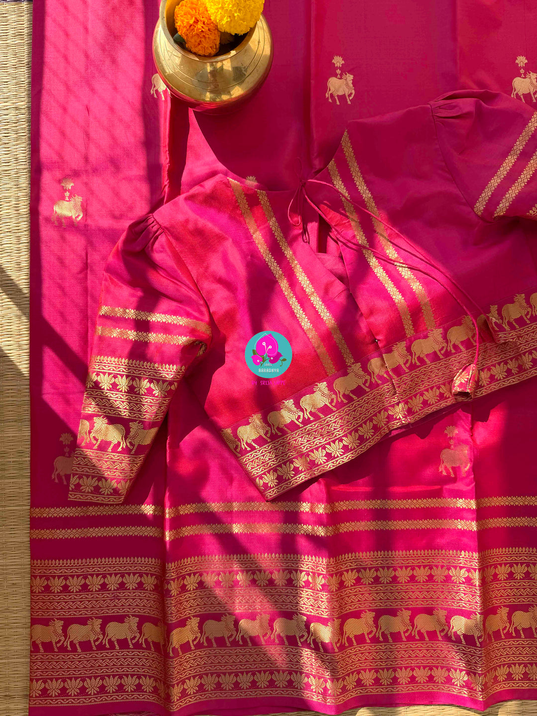 The Blush of Heritage: Pink Kanchi Silk with Sacred Nandhini Motifs