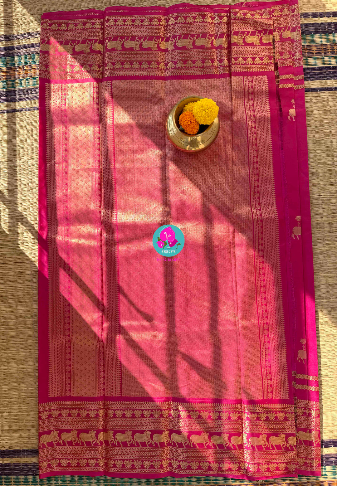 The Blush of Heritage: Pink Kanchi Silk with Sacred Nandhini Motifs