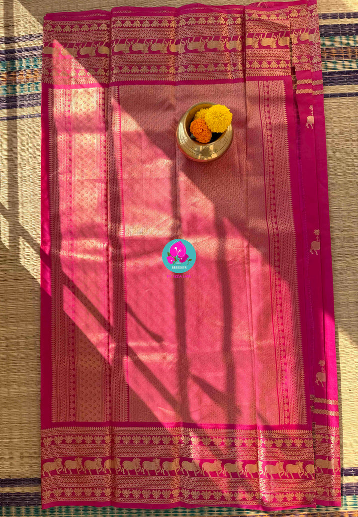 The Blush of Heritage: Pink Kanchi Silk with Sacred Nandhini Motifs