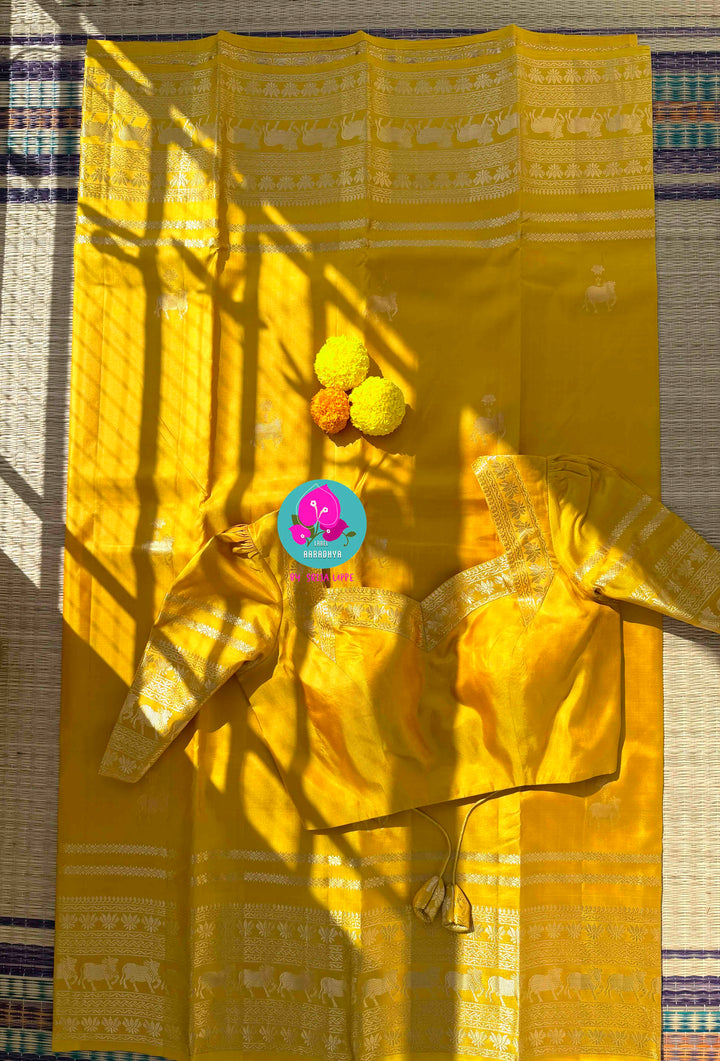 The Gilded Radiance: Yellow Kanchi Silk with Sacred Nandhini Motifs