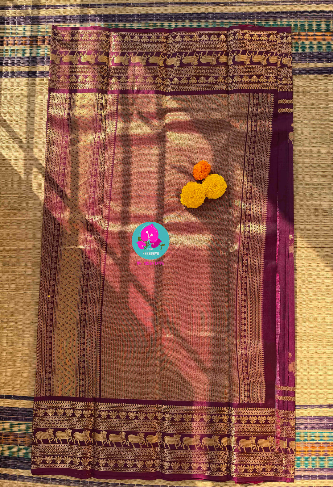 The Velvet Vineyard: Rich Plum Maroon Kanchi Silk with Sacred Nandhini Motifs