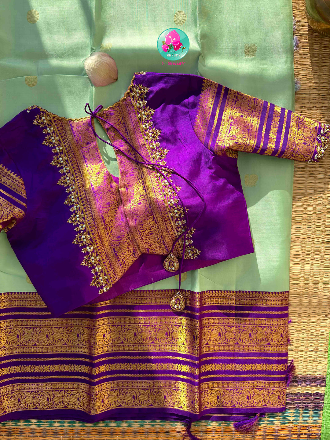 Pastel Serenity & Amethyst Majesty: Lux Green Pure Kanchipattu Saree with Royal Purple Border & Hand-Embroidered Maggam Blouse