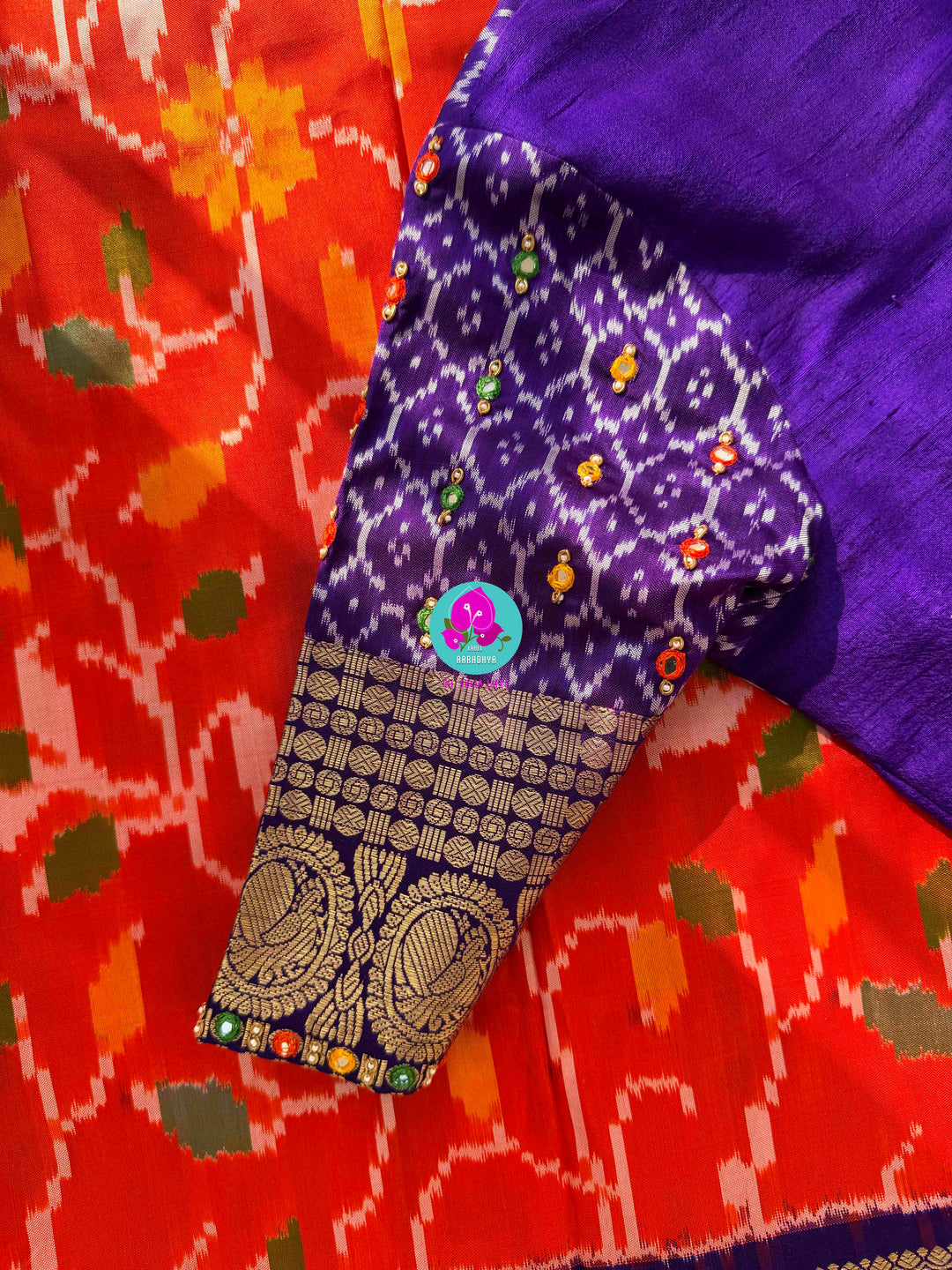 Sunset Symphony: Orange Ikkat Silk with Scalloped Mirror Artistry