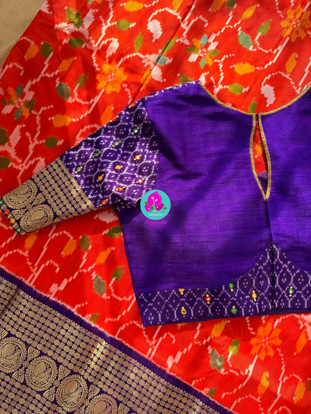 Sunset Symphony: Orange Ikkat Silk with Scalloped Mirror Artistry