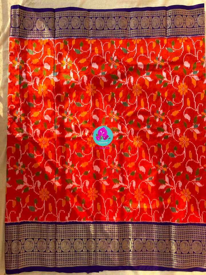 Pure Orange Ikkat Silk Saree with zari on Purple border