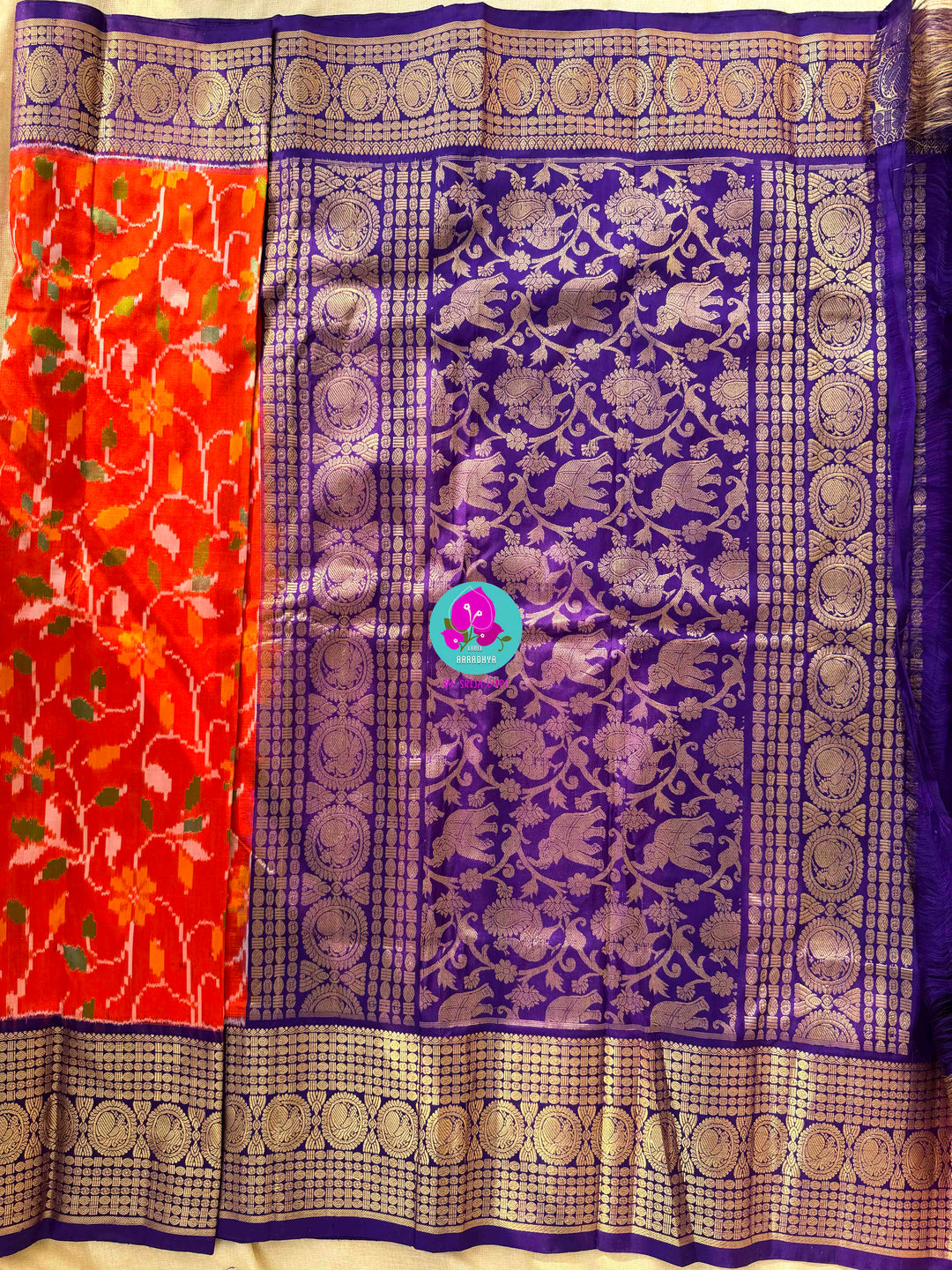 Pure Orange Ikkat Silk Saree with zari on Purple border