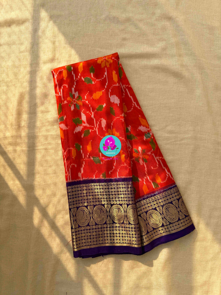 Pure Orange Ikkat Silk Saree with zari on Purple border