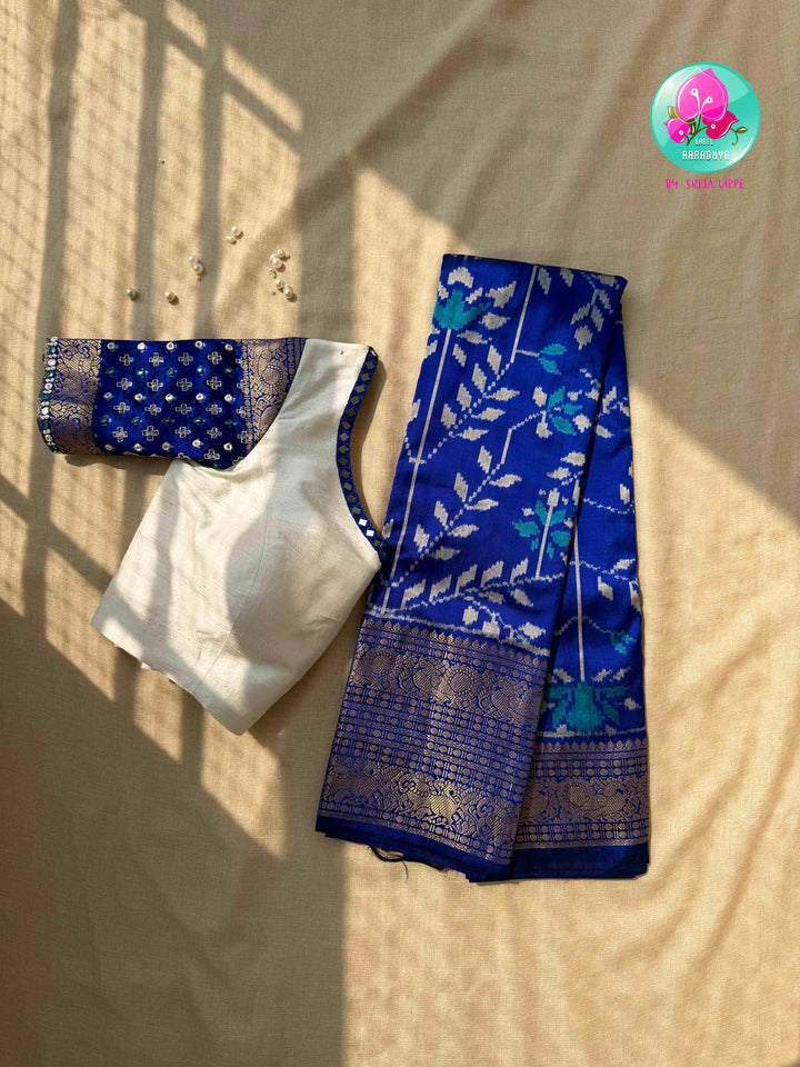 Sapphire Serenade: Royal Blue Ikkat Silk with Kanchi Heritage & Gilded Mirror Artistry