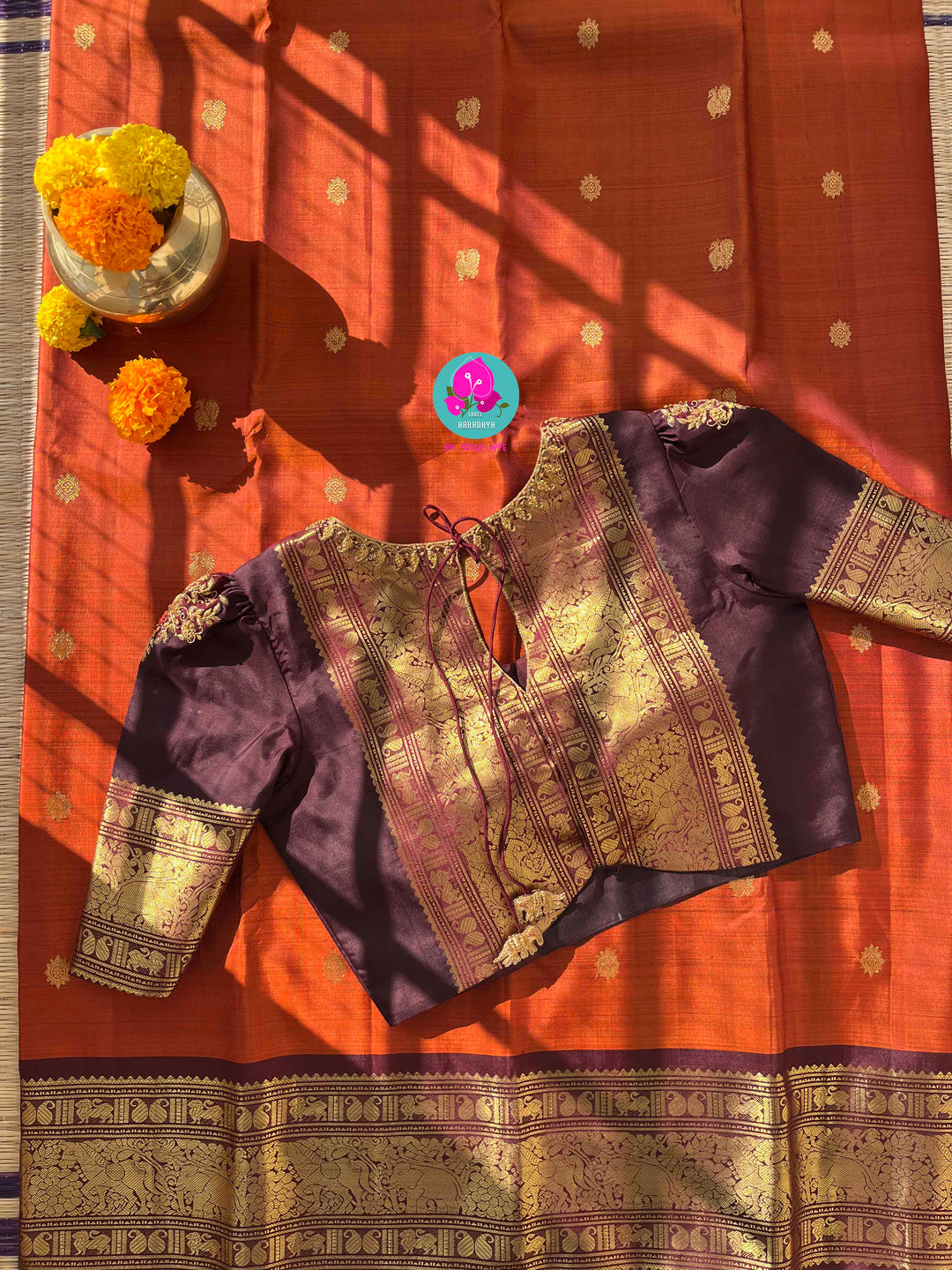 Pure Kanchipattu saree in vintage rust orange and brown border with hand embroidered blouse