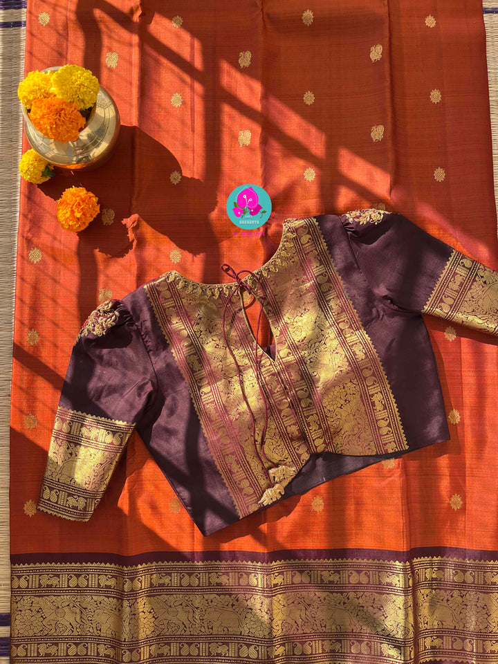 Pure Kanchipattu saree in vintage rust orange and brown border with hand embroidered blouse