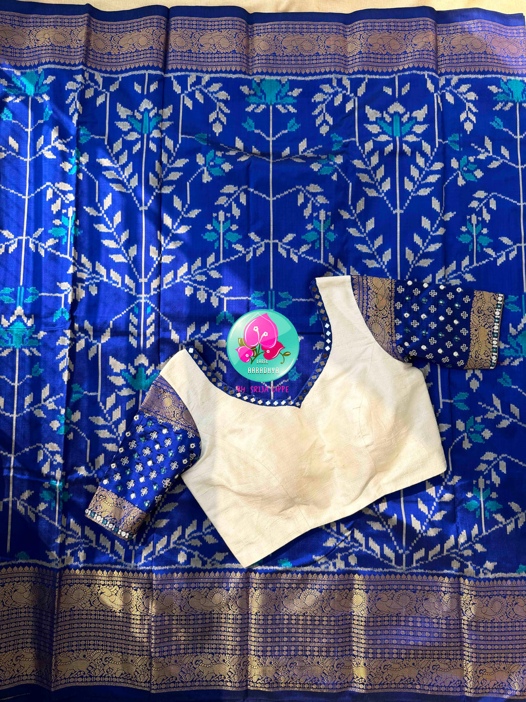 Sapphire Serenade: Royal Blue Ikkat Silk with Kanchi Heritage & Gilded Mirror Artistry