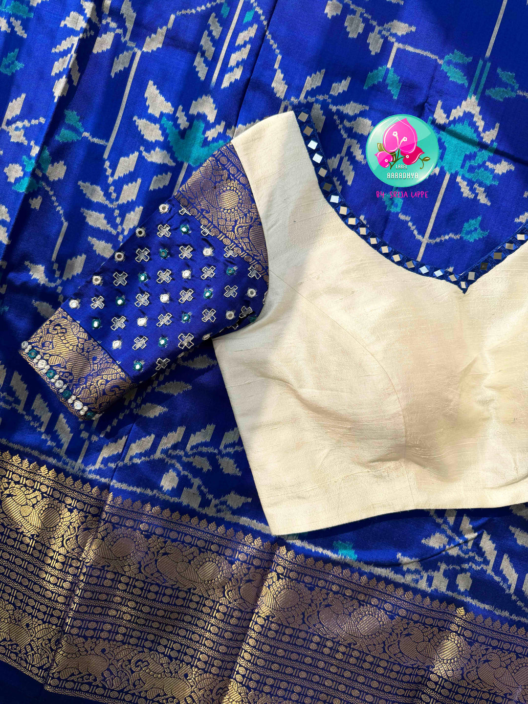 Sapphire Serenade: Royal Blue Ikkat Silk with Kanchi Heritage & Gilded Mirror Artistry