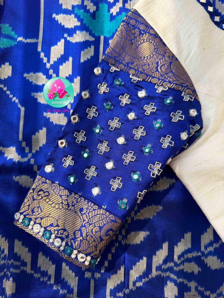 Sapphire Serenade: Royal Blue Ikkat Silk with Kanchi Heritage & Gilded Mirror Artistry