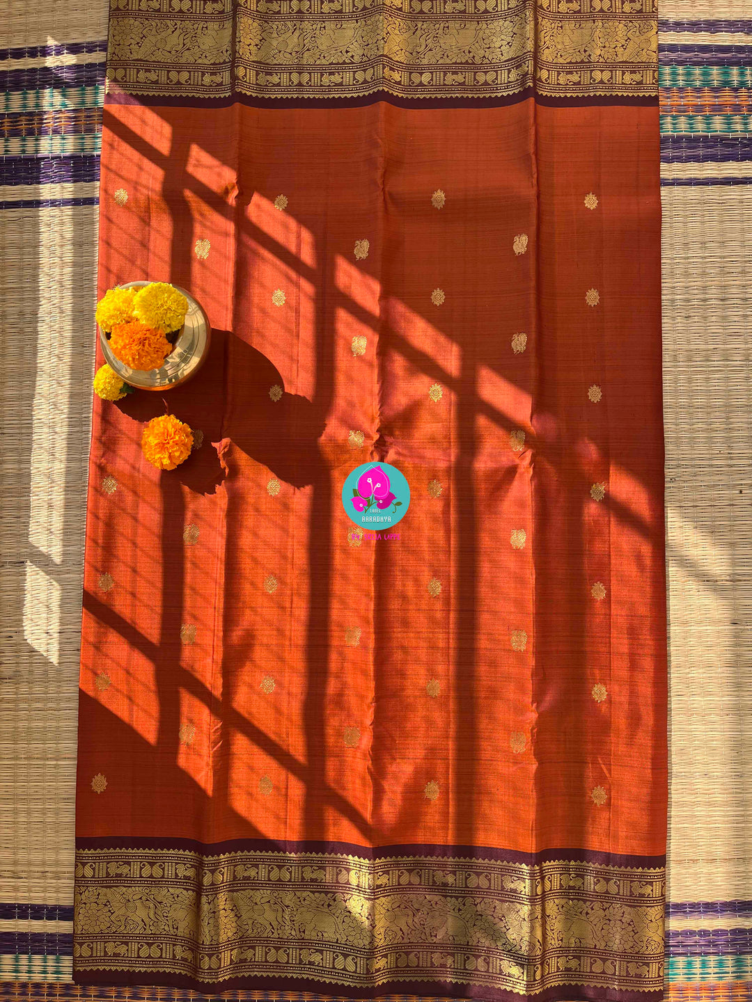 Pure Kanchipattu saree in vintage rust orange and brown border with hand embroidered blouse