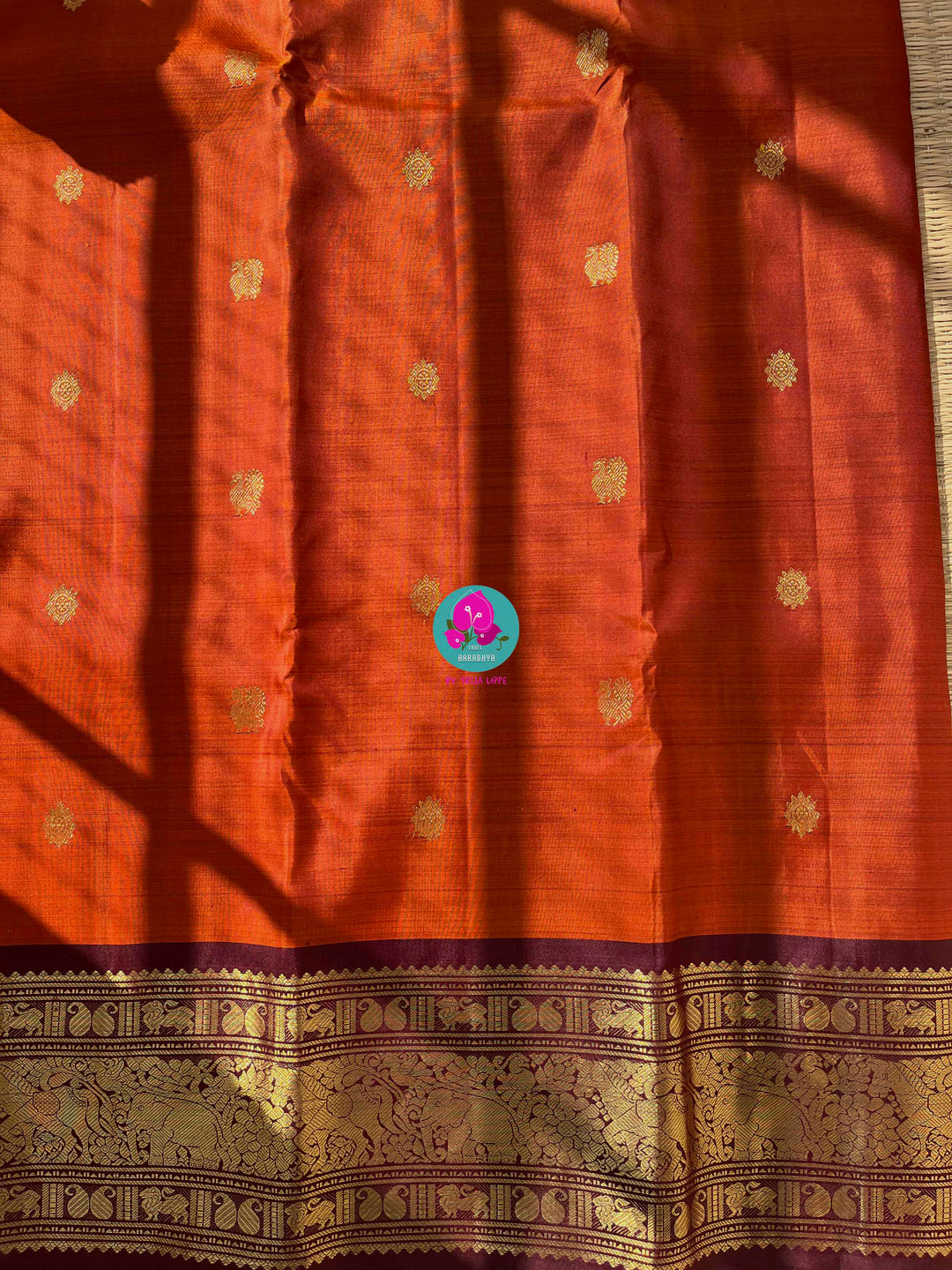 Pure Kanchipattu saree in vintage rust orange and brown border with hand embroidered blouse
