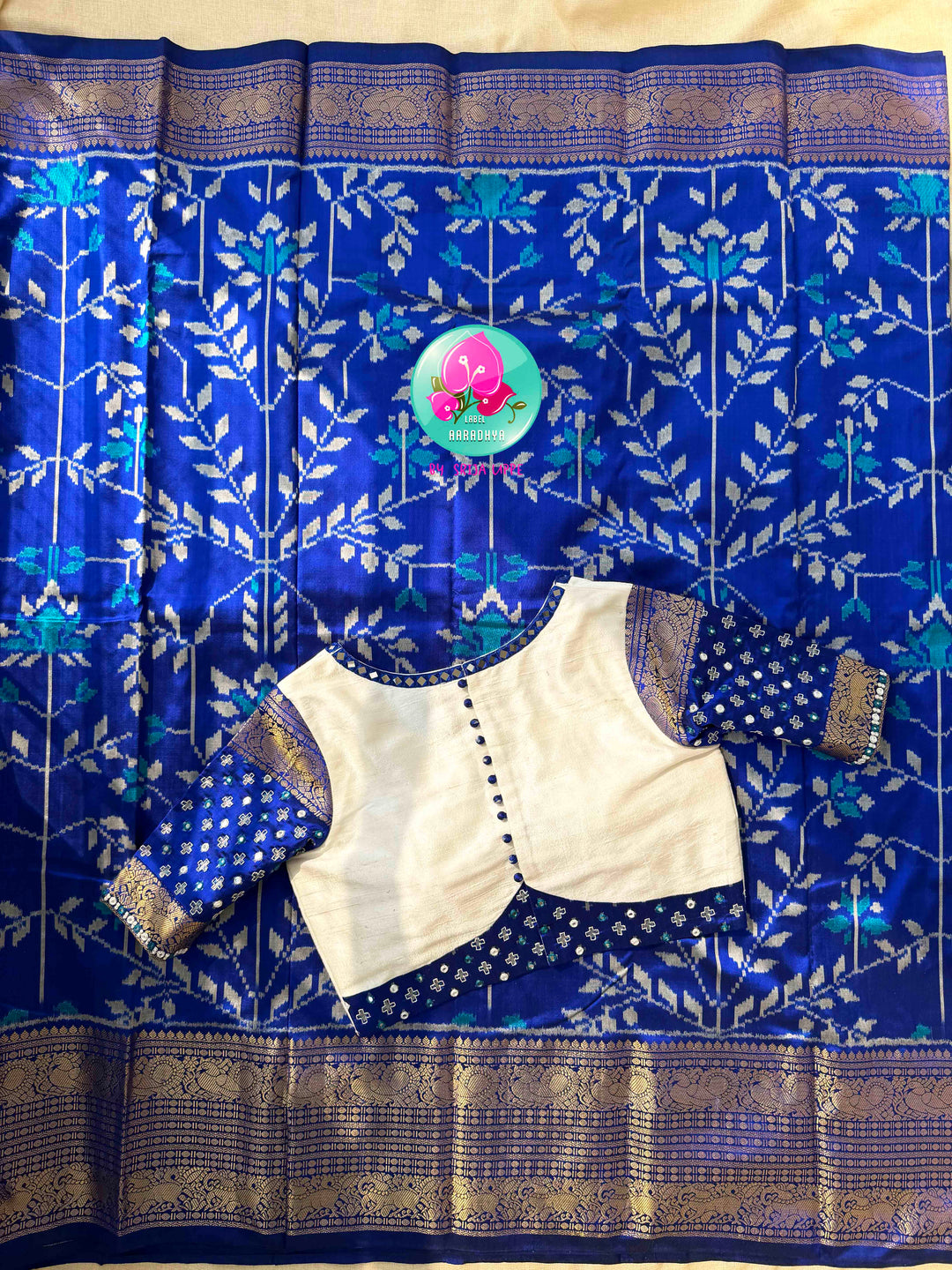 Sapphire Serenade: Royal Blue Ikkat Silk with Kanchi Heritage & Gilded Mirror Artistry