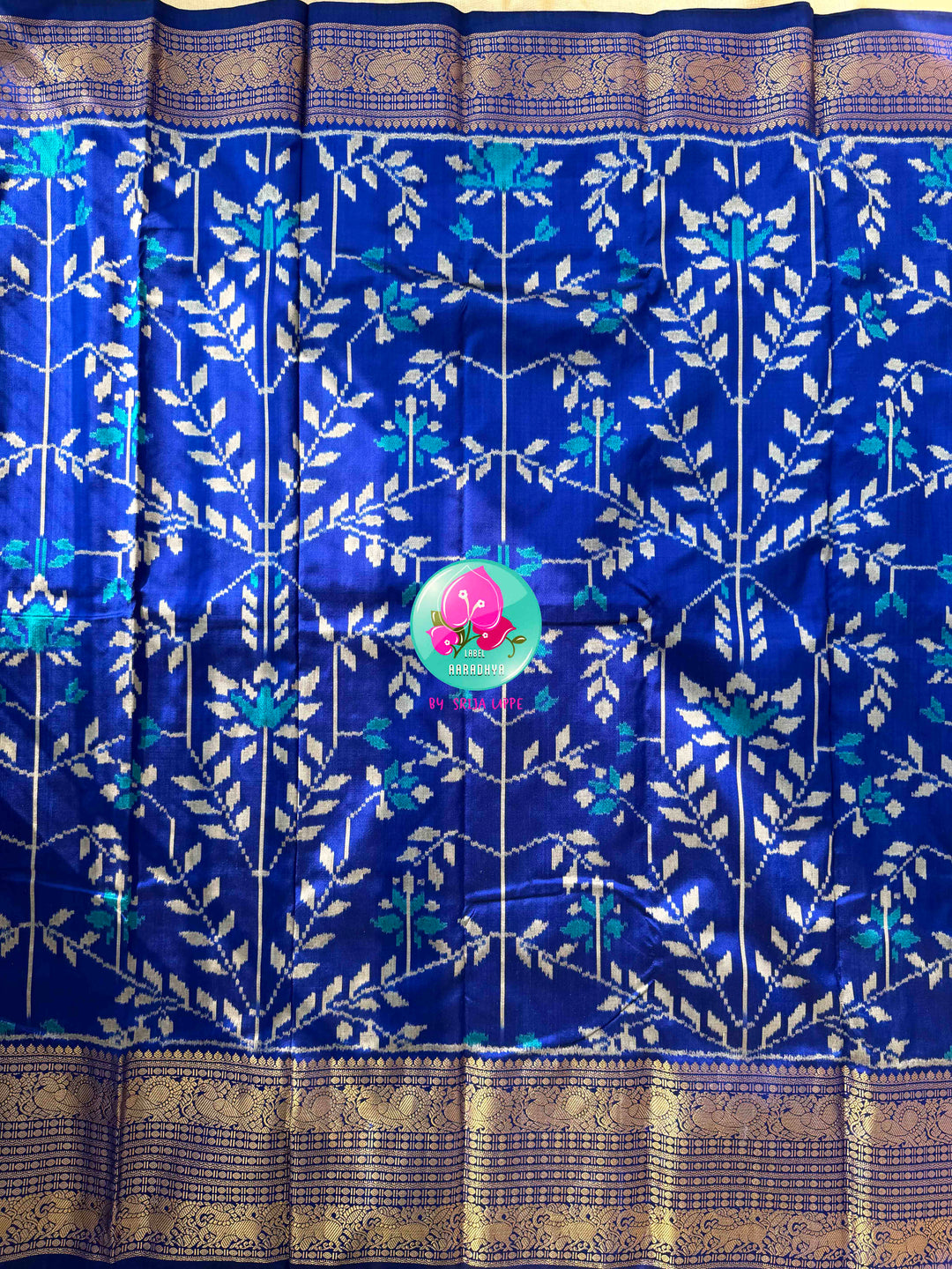 Sapphire Serenade: Royal Blue Ikkat Silk with Kanchi Heritage & Gilded Mirror Artistry