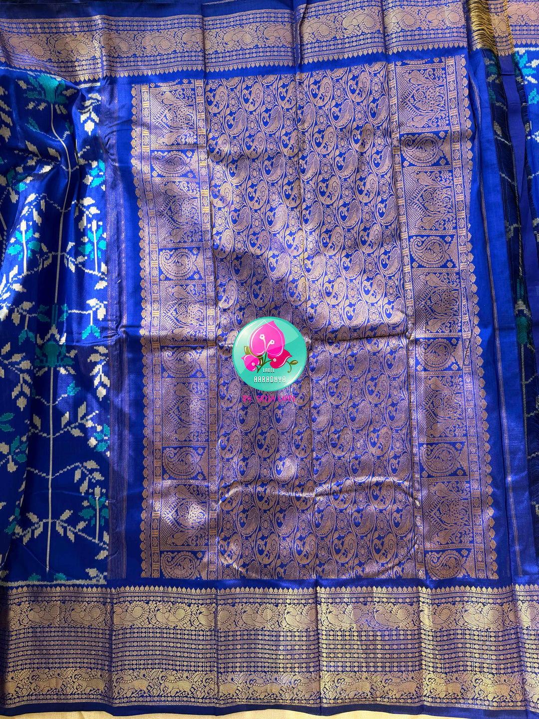 Sapphire Serenade: Royal Blue Ikkat Silk with Kanchi Heritage & Gilded Mirror Artistry