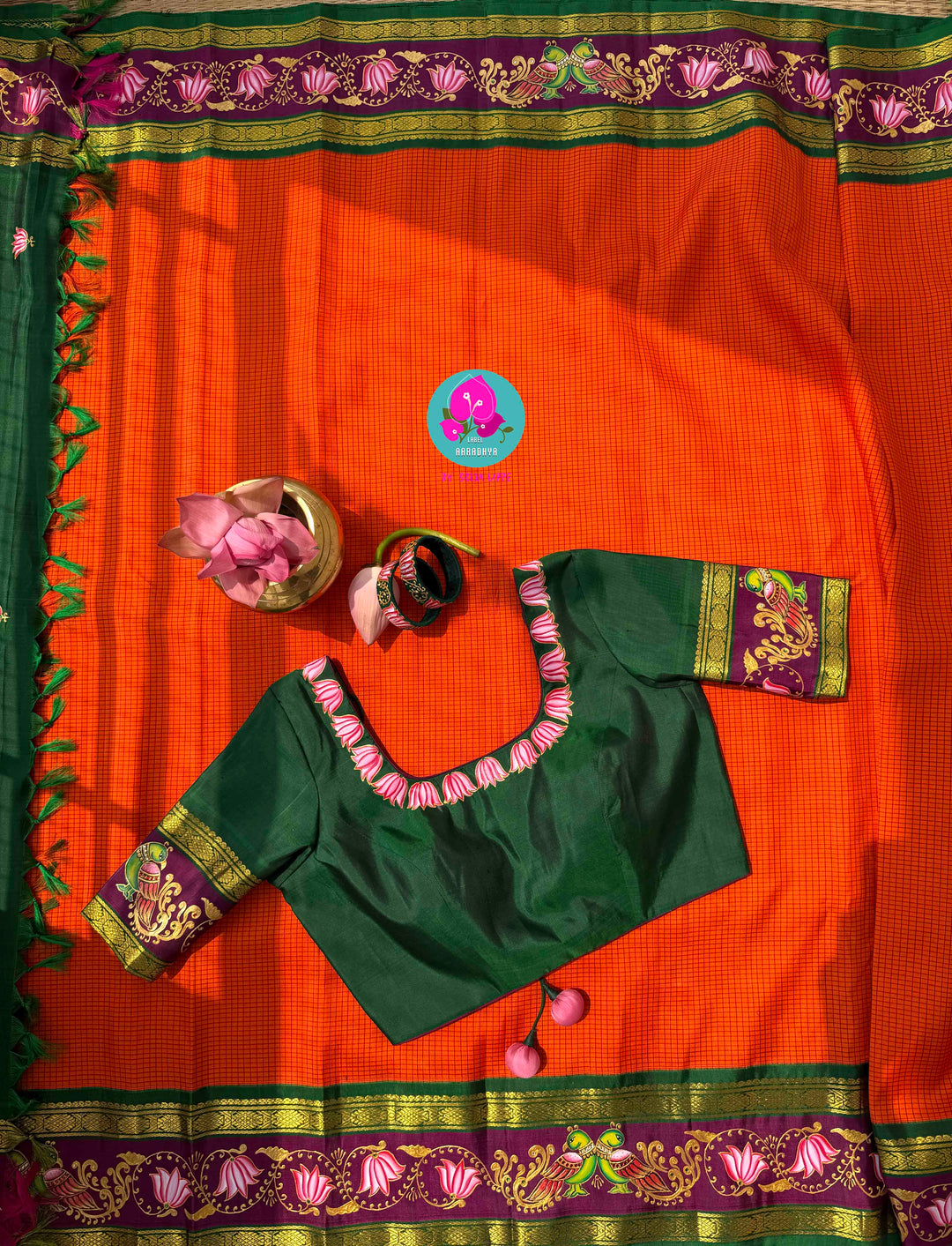 Fusion of Art & Weave: Tanjore Hand-Painted Kanchipattu Saree in Sunset Orange & Green