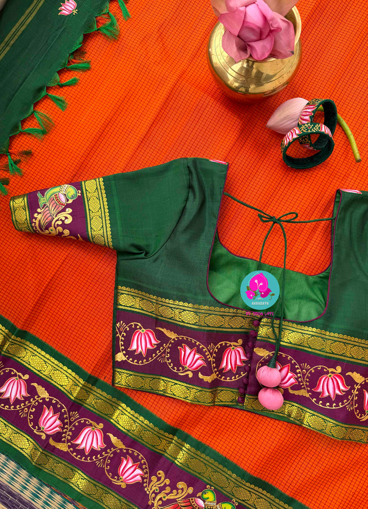 Fusion of Art & Weave: Tanjore Hand-Painted Kanchipattu Saree in Sunset Orange & Green
