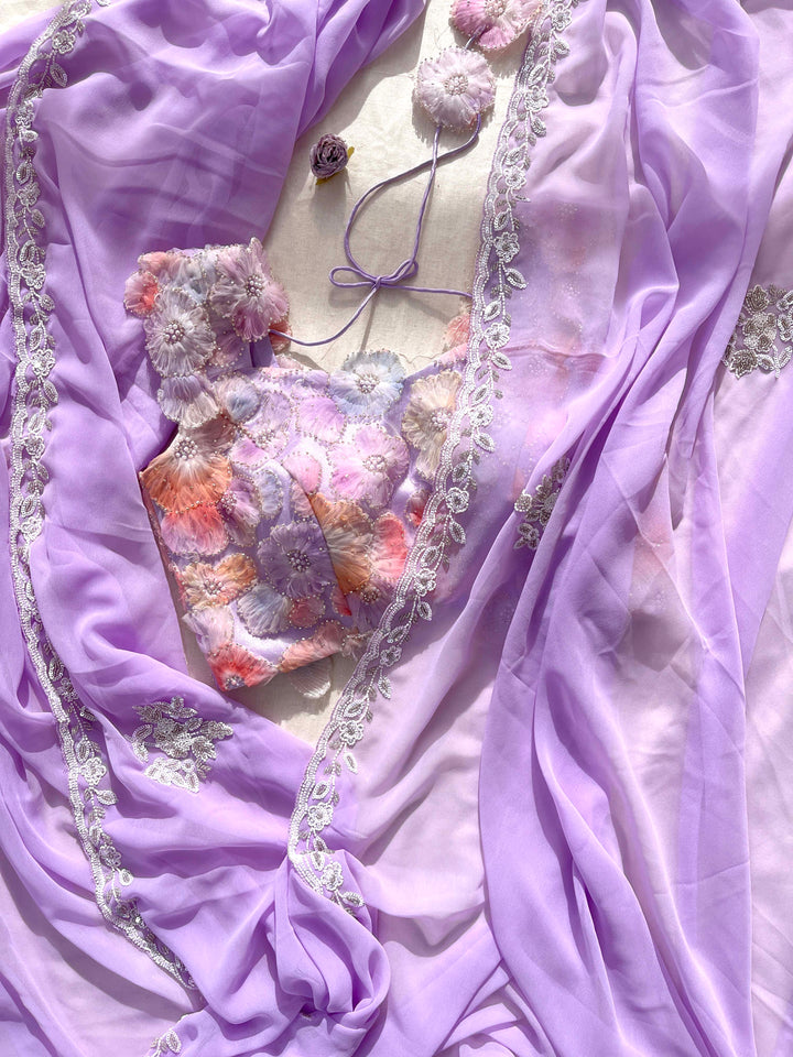 Hand embroidered georgette Lavender saree with Embellished Net Fashion Blouse