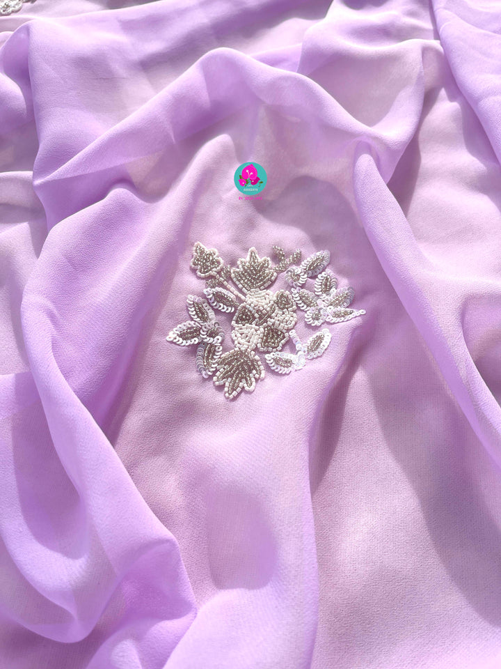 Hand embroidered georgette Lavender saree with Embellished Net Fashion Blouse