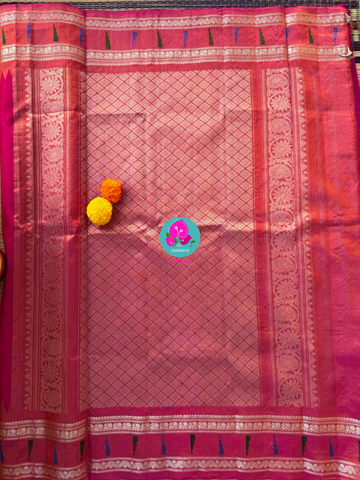 Petals of Luminescence: Pure Tissue Gadwal in Radiant Pink with 3D Jewel Artistry
