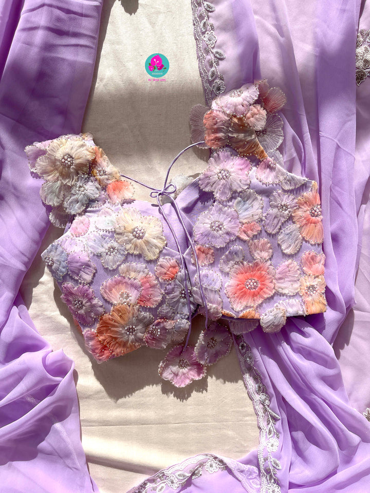 Hand embroidered georgette Lavender saree with Embellished Net Fashion Blouse