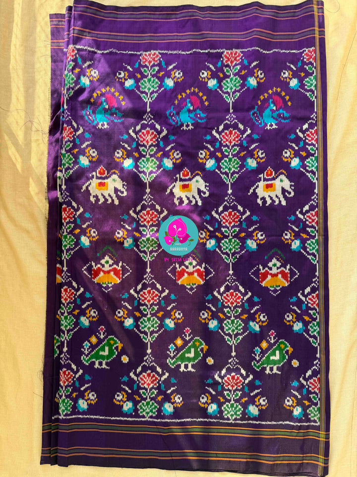 Radiant Amethyst: Violet Pure Ikkat Silk with Hand-Embroidered Madhubala Artistry