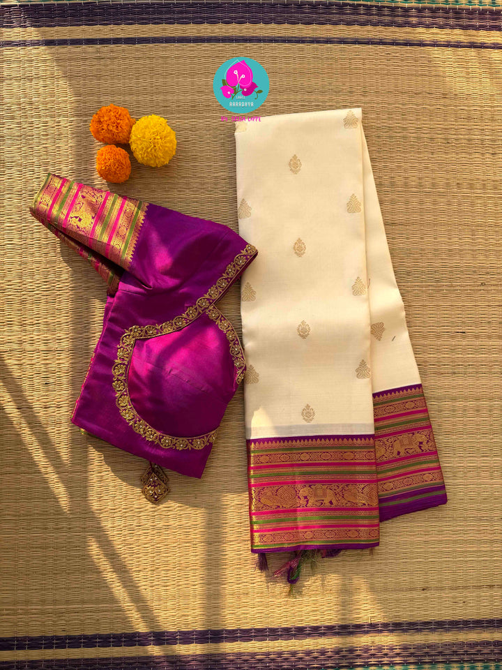 Ivory Radiance & Magenta Majesty: Handloom Kanchipattu with Meticulous Gold Artistry