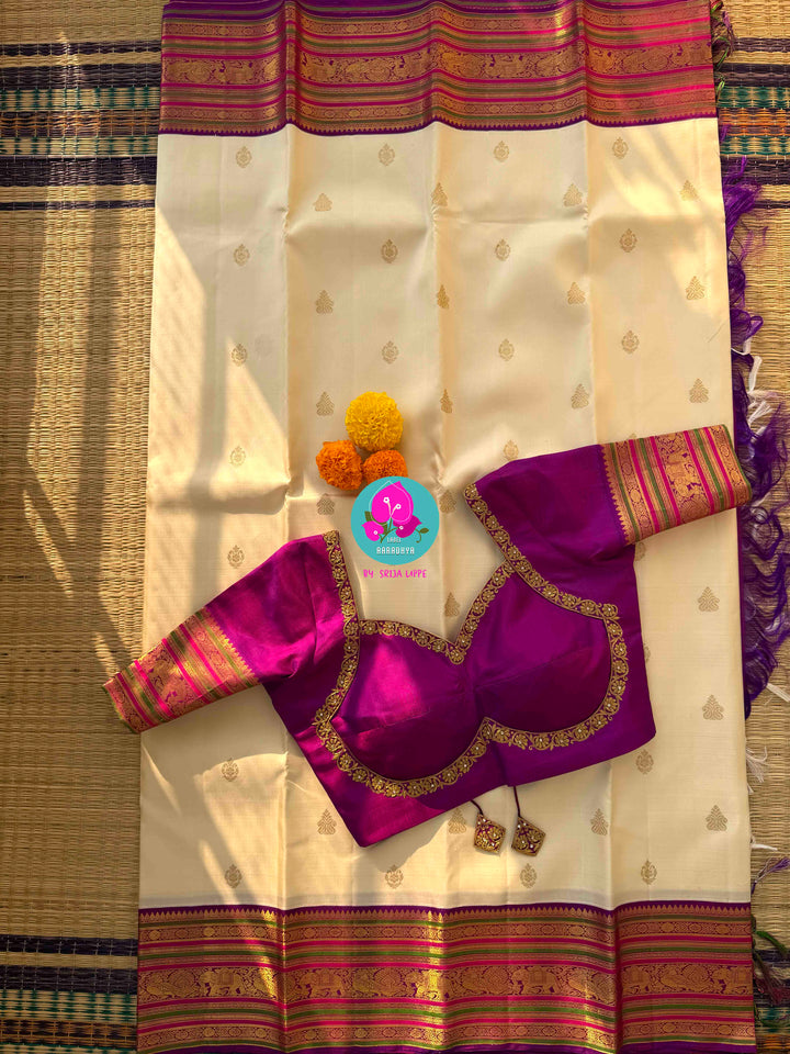 Ivory Radiance & Magenta Majesty: Handloom Kanchipattu with Meticulous Gold Artistry