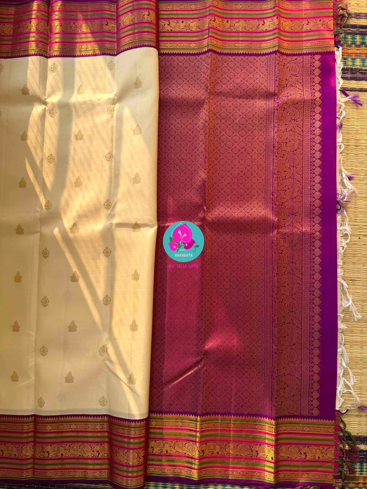 Ivory Radiance & Magenta Majesty: Handloom Kanchipattu with Meticulous Gold Artistry