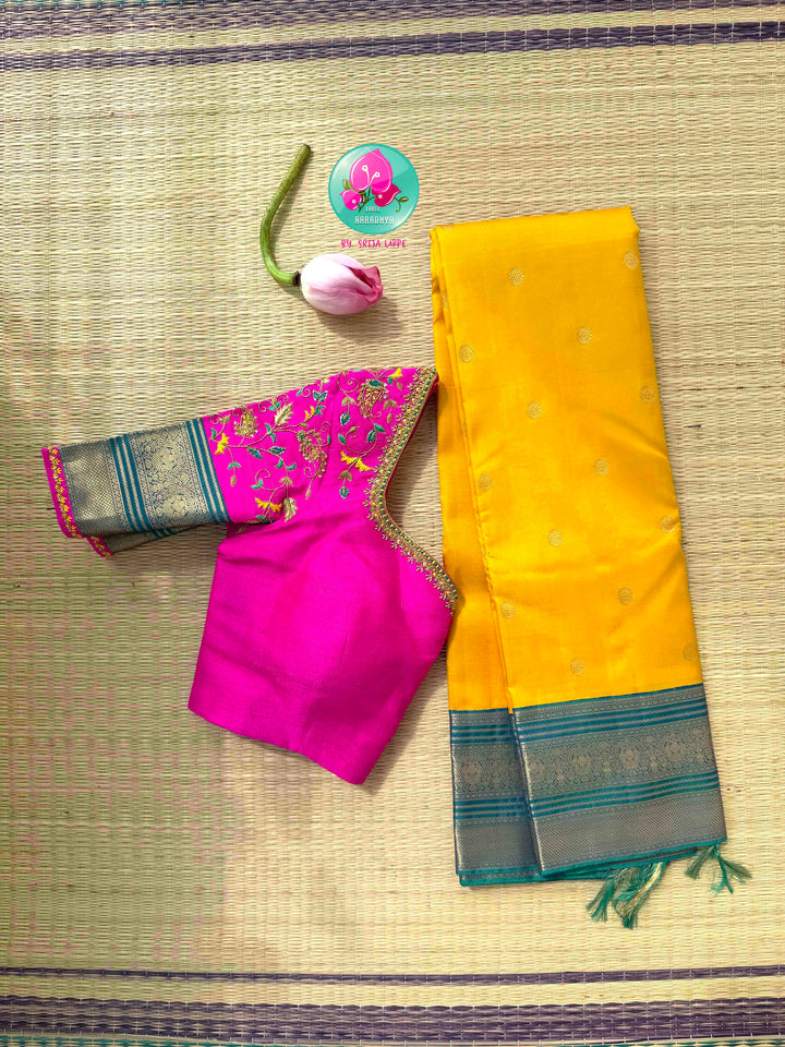 Vintage Radiance & High-Contrast Splendor: Mustard Yellow Pure Kanjeevaram Saree with Peacock Blue Border & Rani Pink Maggam Blouse