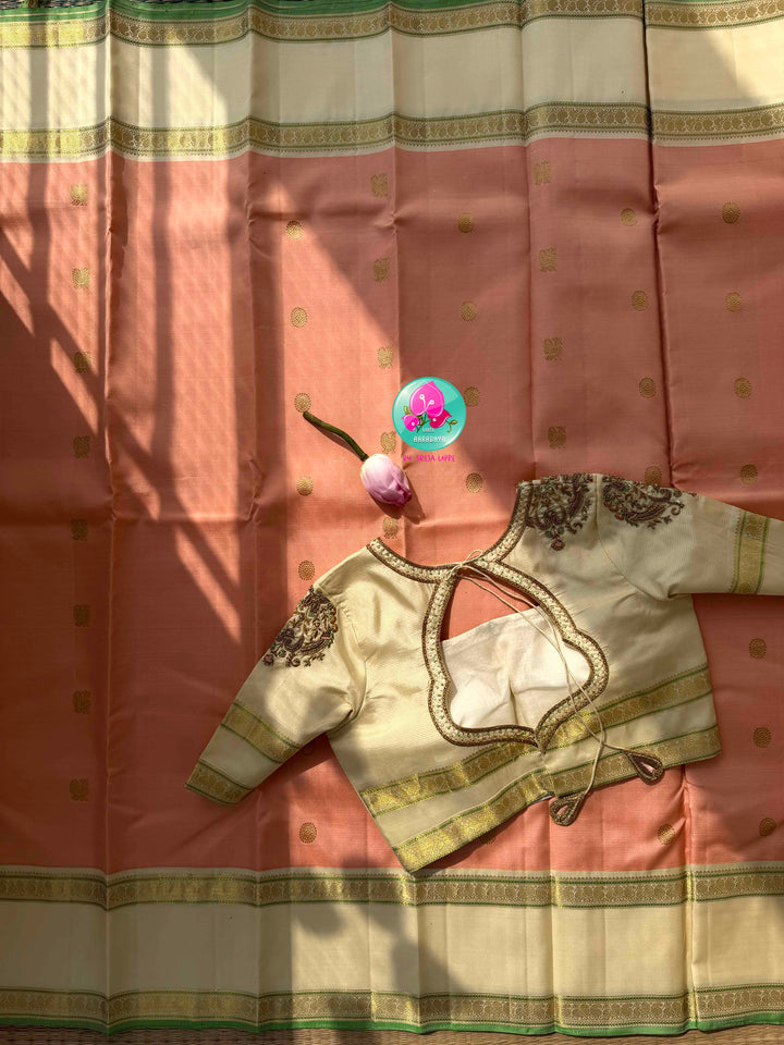 Traditional Perfection: Pure Peach-Coral Vaira Oosi Kanchipattu Saree with Gap Border & Off-White Hand Embroidered Maggam Blouse