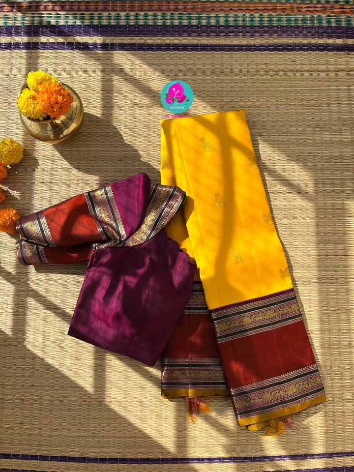 Chrysanthemum Yellow Kanchipattu Saree paired with blouse for Auspicious Occasions