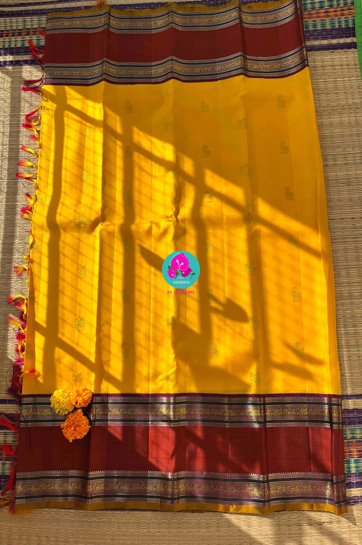 Chrysanthemum Yellow Kanchipattu Saree paired with blouse for Auspicious Occasions