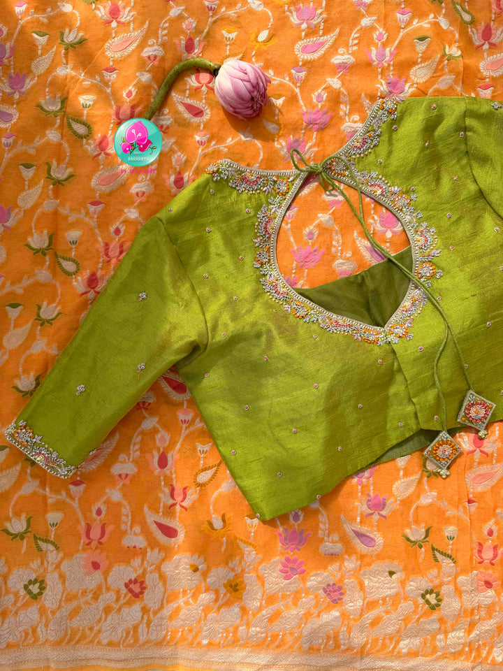 Luminous Citrus Grace & Parrot Green Splendor: Pure Banarasi Khaddi Georgette Orange Saree with Hand-Embroidered Tissue Raw Silk Blouse