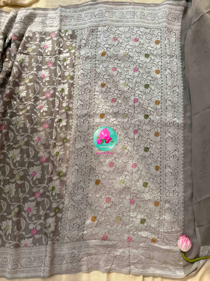 Ethereal Charcoal Sheen & Rose Quartz Splendor: Pure Banarasi Khaddi Georgette Grey Saree with Hand-Embroidered Pink Tissue Raw Silk Blouse