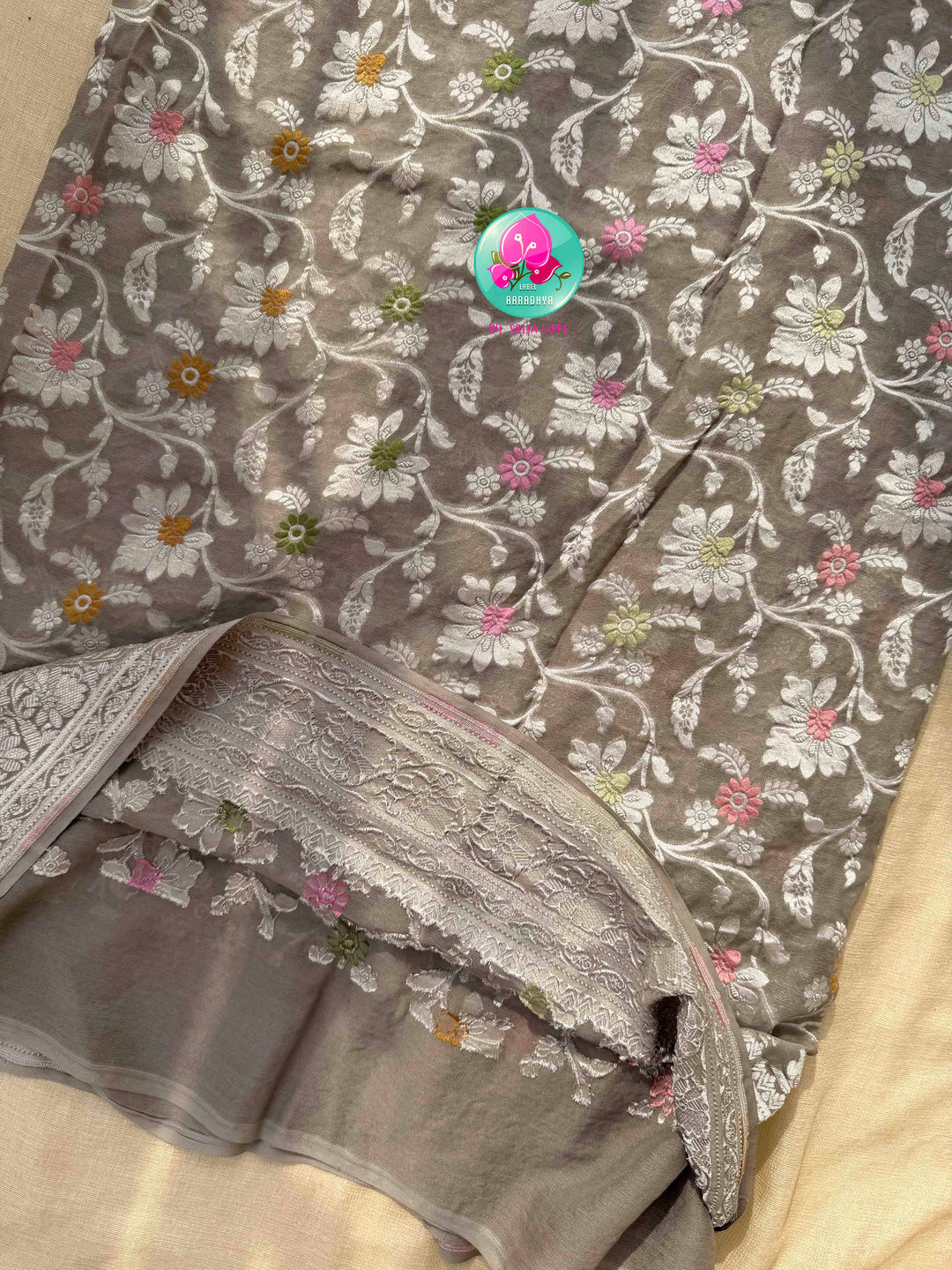 Ethereal Charcoal Sheen & Rose Quartz Splendor: Pure Banarasi Khaddi Georgette Grey Saree with Hand-Embroidered Pink Tissue Raw Silk Blouse