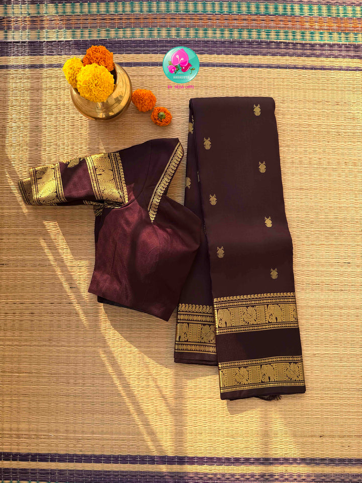 A Legacy of Power: Trendy Brown Kanchipattu silk Saree with Commanding Gandaberunda Motifs
