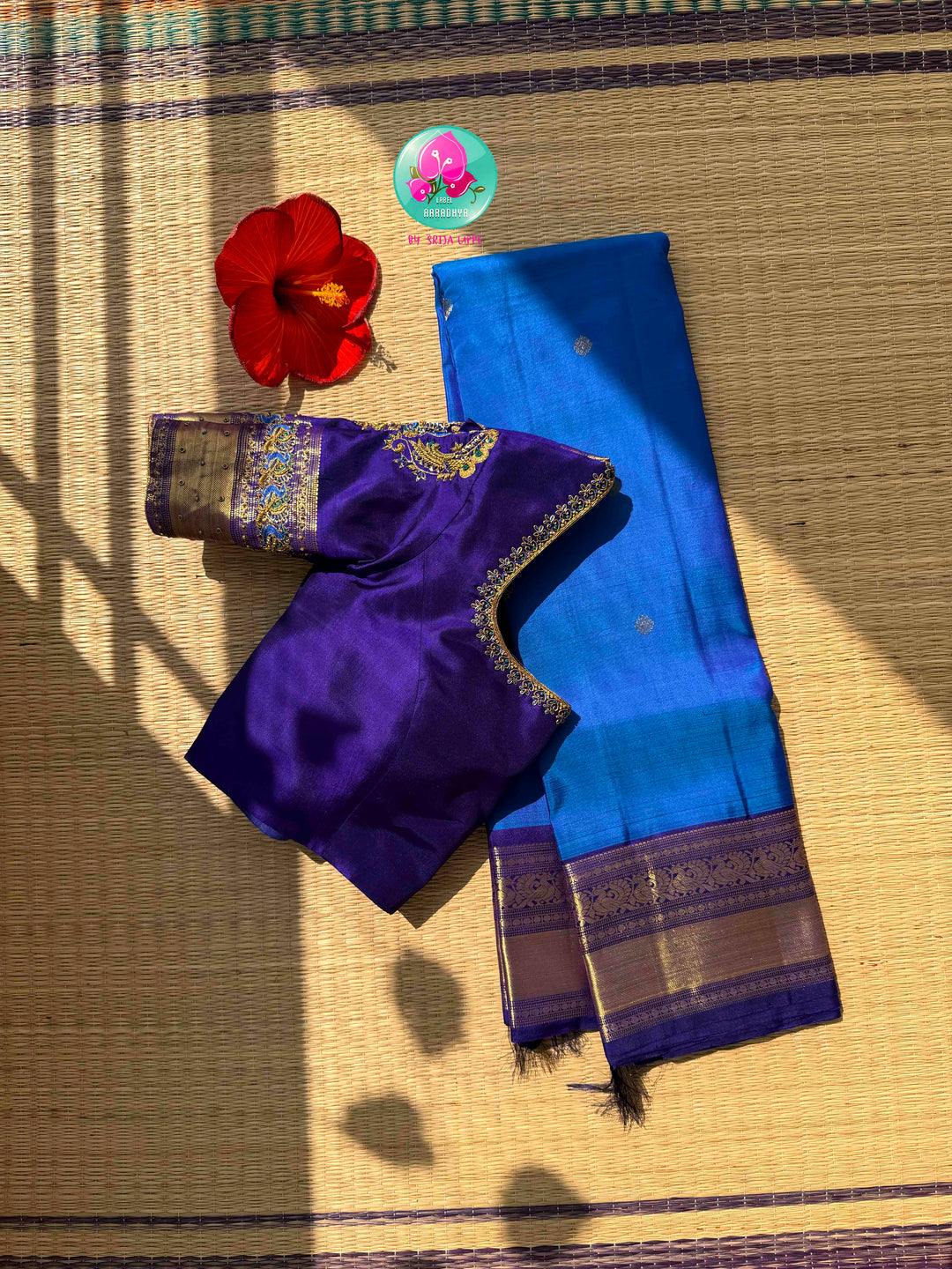 Regal Sapphire & Deep Indigo Elegance: Pure Sky-Blue Kanchipattu Saree with Deep Navy-Purple Border & Intricate Hand-Embroidered Maggam Blouse