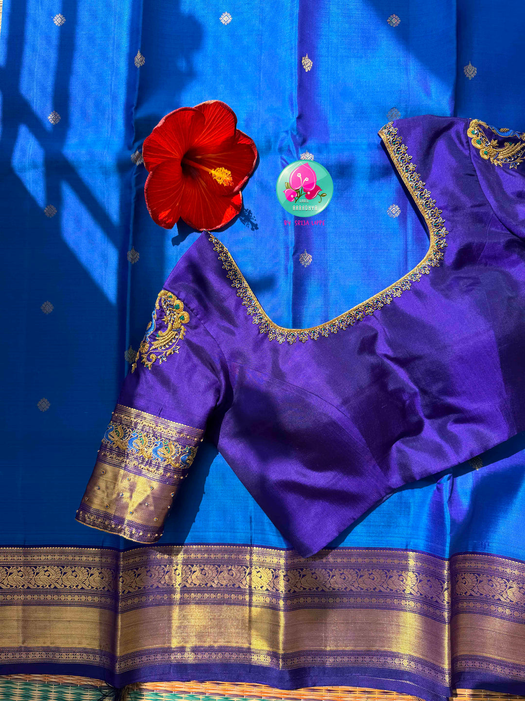 Regal Sapphire & Deep Indigo Elegance: Pure Sky-Blue Kanchipattu Saree with Deep Navy-Purple Border & Intricate Hand-Embroidered Maggam Blouse