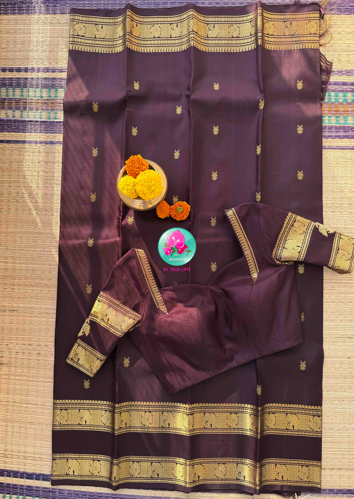 A Legacy of Power: Trendy Brown Kanchipattu silk Saree with Commanding Gandaberunda Motifs