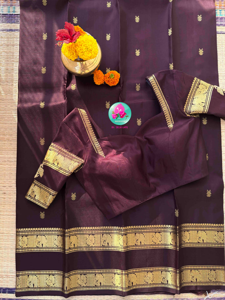 A Legacy of Power: Trendy Brown Kanchipattu silk Saree with Commanding Gandaberunda Motifs